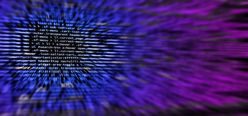Computer code with purple and blue aura