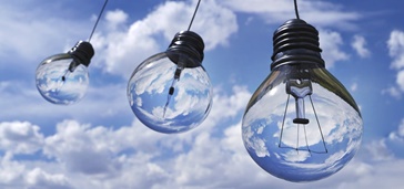 12_26_don-t-wait-to-start-planning-your-migration-to-cloud-communication Photo of light bulbs with sky behind.