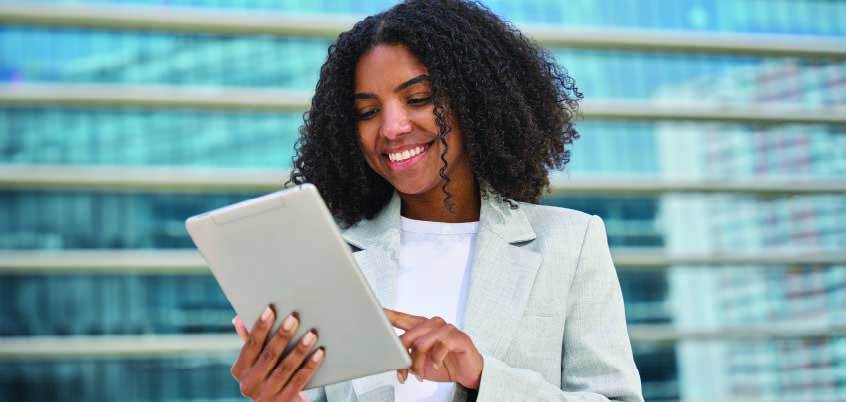 woman using tablet outside