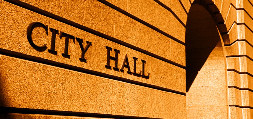 Closeup of City Hall sign on building