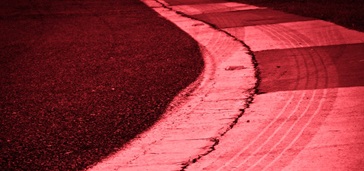 howreal-timevideoistransformingthepitstop curved part of a racetrack, pink tint