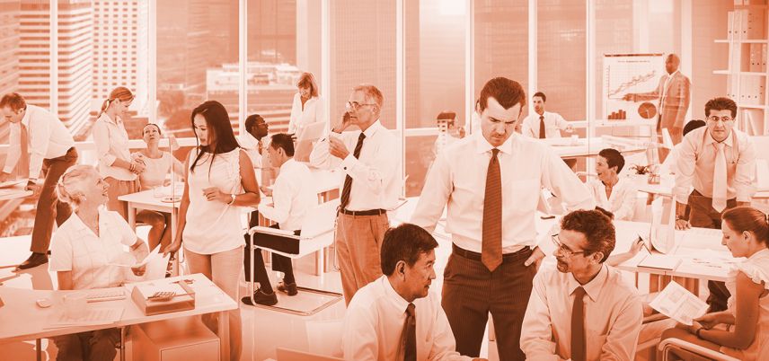 office full of workers, orange-pink tint over entire image