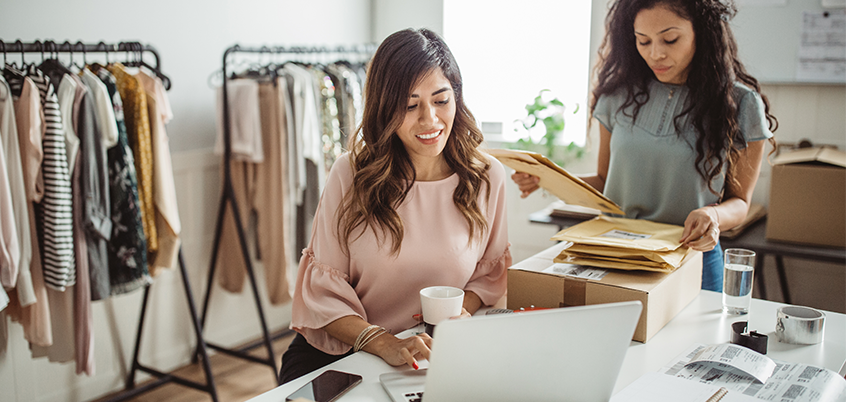 Woman looking at laptop